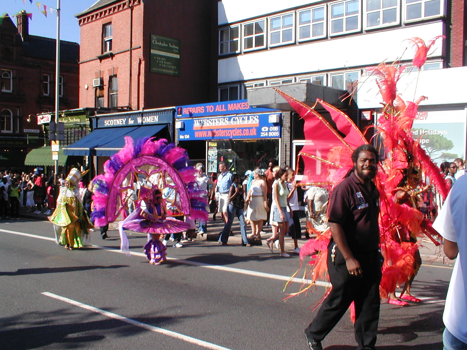 Costumed participants taking part in Leicester Caribbean Carnival.